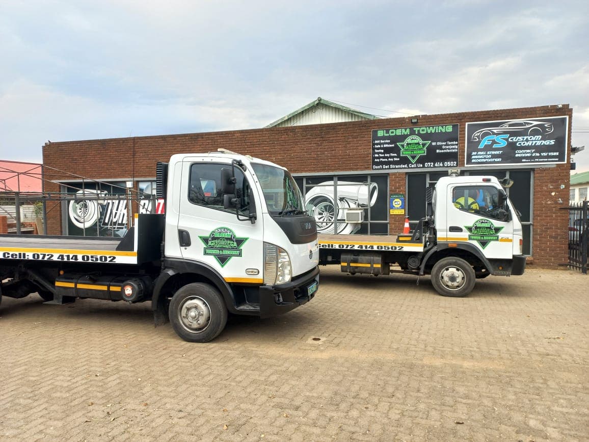Bloem Towing flatbed truck parked outside the Hamilton premises